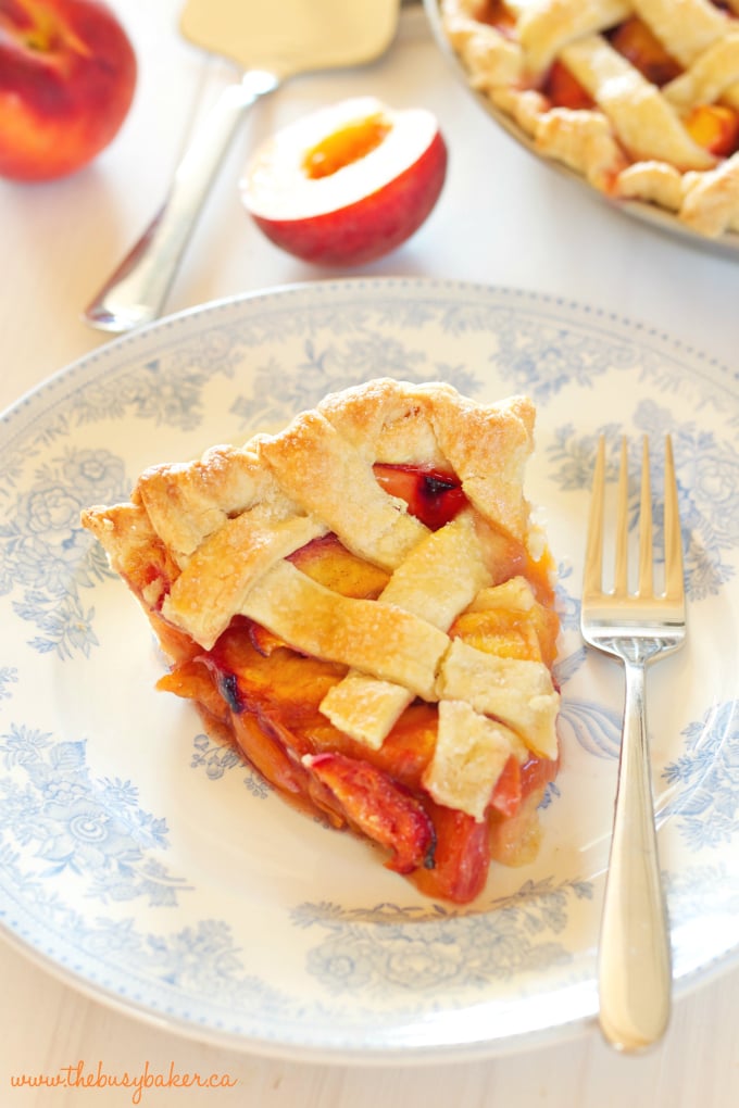 This Easy Classic Peach Pie recipe is simple and rustic, made with a butter crust and fresh peaches. Recipe includes my pro tips for the perfect pie every time! www.thebusybaker.ca
