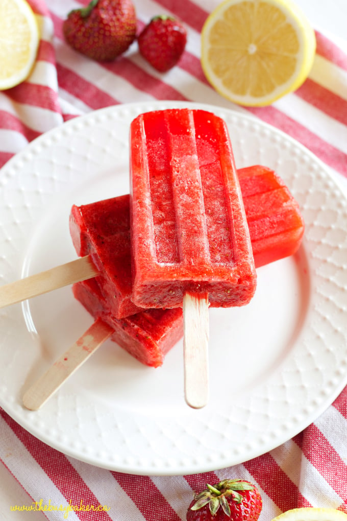 These Strawberry Lemonade Popsicles are the perfect healthy easy to make summer treat that's made with fresh strawberries and lemons! Perfect for kids! Recipe from thebusybaker.ca