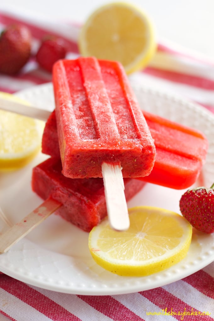 These Strawberry Lemonade Popsicles are the perfect healthy easy to make summer treat that's made with fresh strawberries and lemons! Perfect for kids! Recipe from thebusybaker.ca