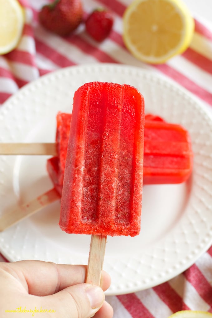 These Strawberry Lemonade Popsicles are the perfect healthy easy to make summer treat that's made with fresh strawberries and lemons! Perfect for kids! Recipe from thebusybaker.ca