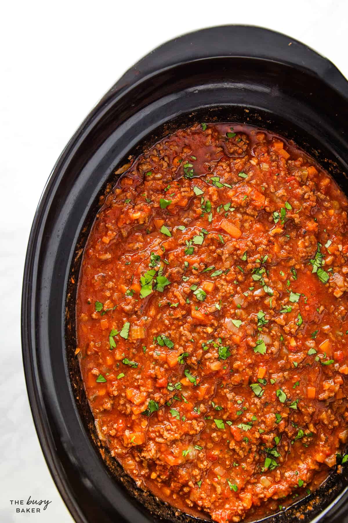 slow cooker full of spaghetti sauce