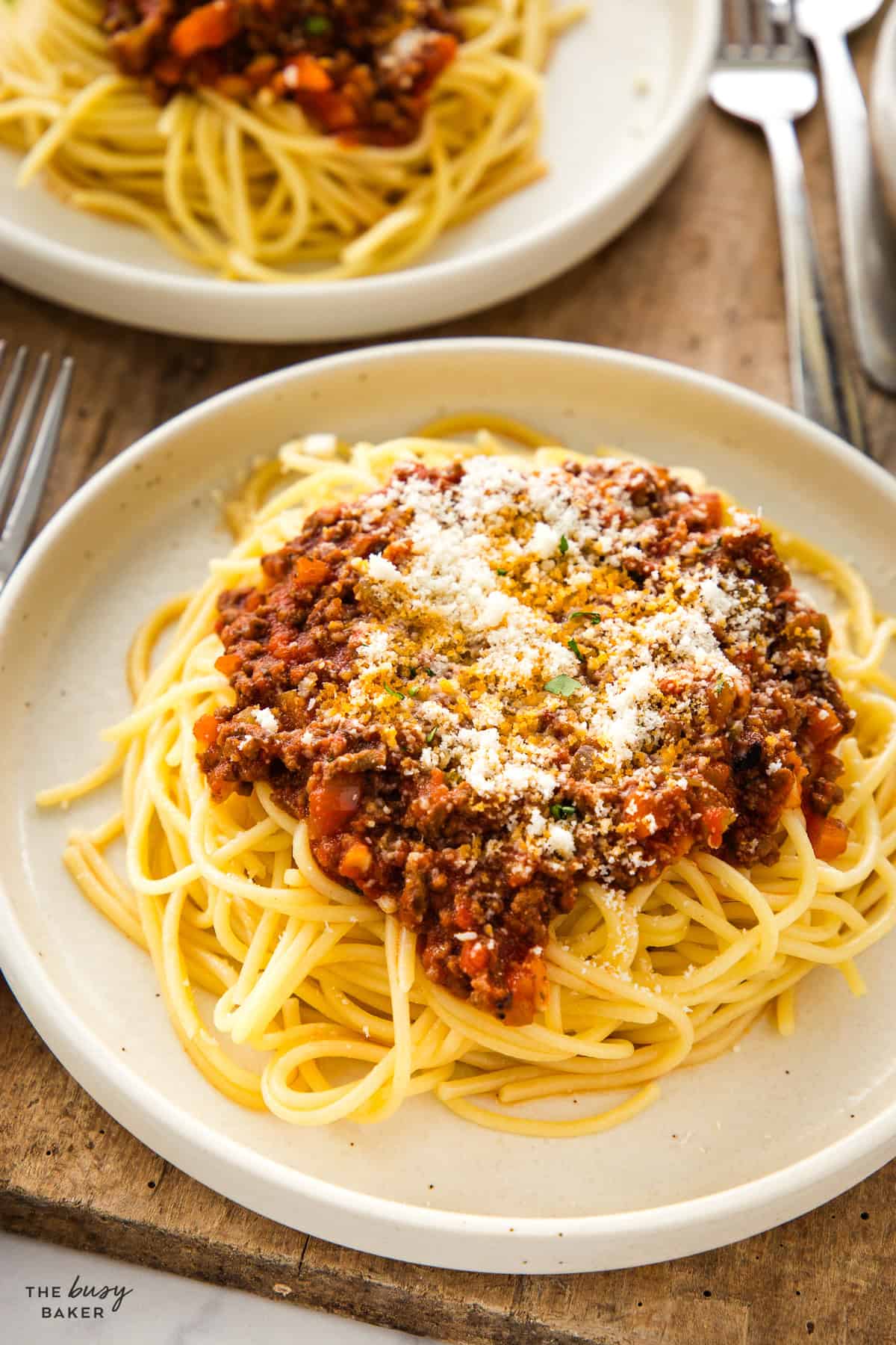 spaghetti with meat sauce and parmesan