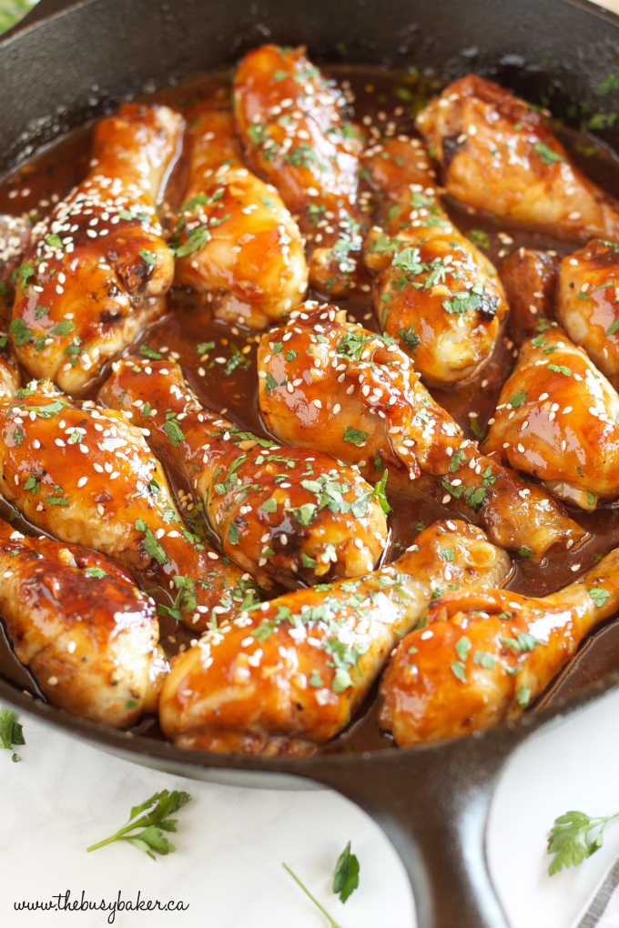 This One Pan Honey Garlic Chicken is an easy weeknight meal idea with a simple 5-ingredient sticky sauce, made all in one pan in less than 30 minutes! Recipe from thebusybaker.ca!