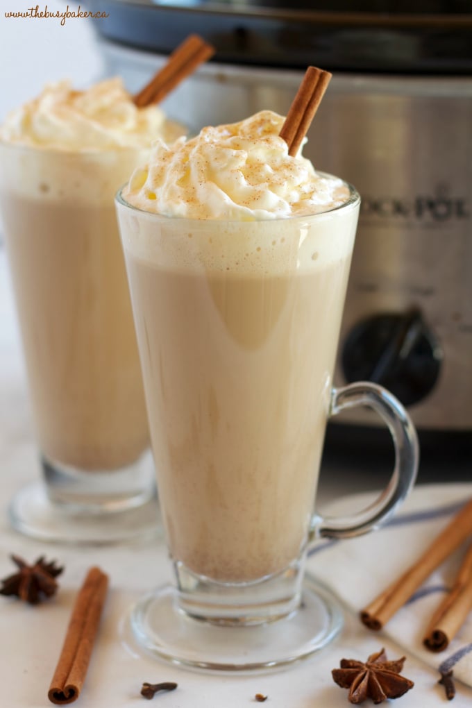 This Slow Cooker Pumpkin Spice Latte is the perfect warm fall drink with everybody's favorite pumpkin spice flavors - it's easy to make in the Crock Pot or slow cooker, and it's great for parties! Recipe from thebusybaker.ca!