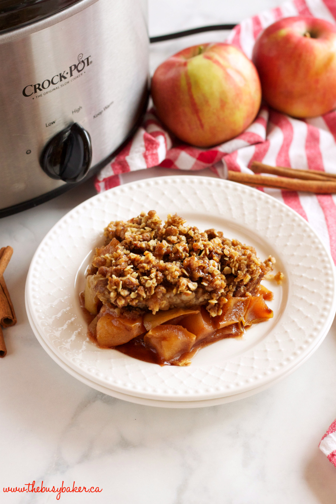 This Slow Cooker Apple Crisp recipe is an easy fall dessert made with fresh apples and a few basic pantry ingredients in the slow cooker or Crock Pot! Recipe from thebusybaker.ca!
