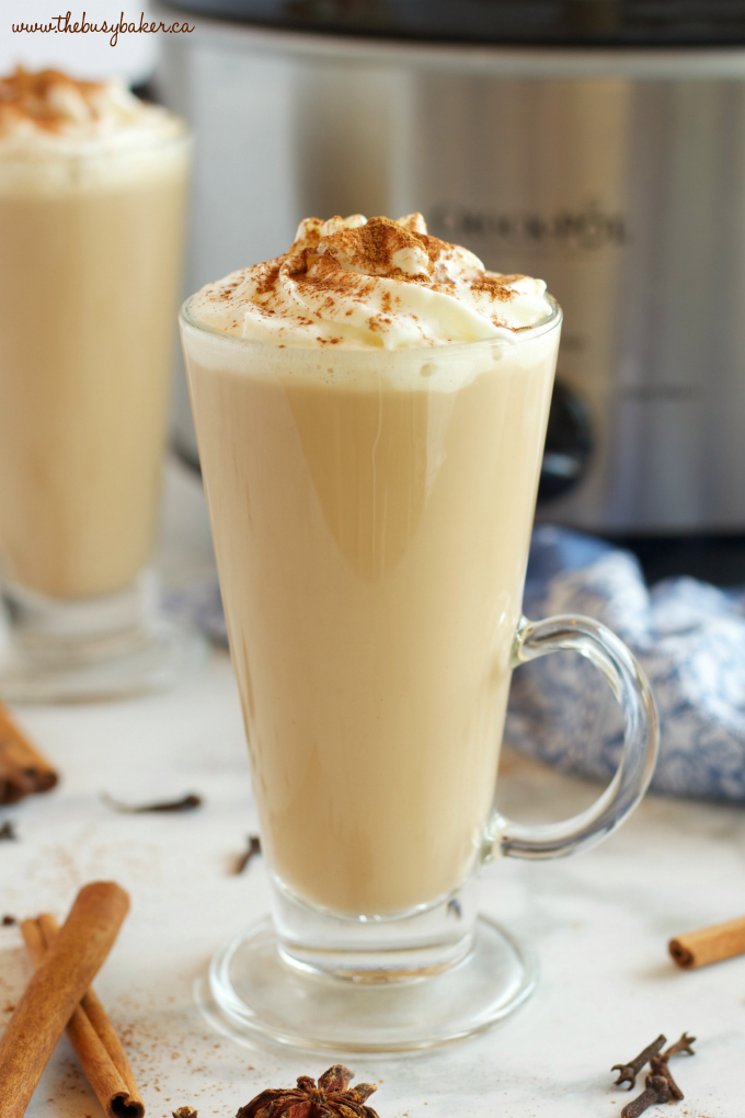 This Slow Cooker Chai Tea Latte is the perfect healthier warm drink for the holidays, and it's so easy to make with only a few simple ingredients! Recipe from thebusybaker.ca! #chailatte #homemadechailatte #slowcookerlatte #crockpotlatte