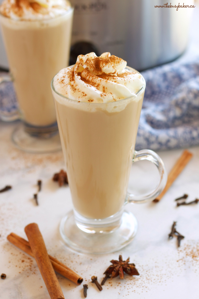This Slow Cooker Chai Tea Latte is the perfect healthier warm drink for the holidays, and it's so easy to make with only a few simple ingredients! Recipe from thebusybaker.ca! #chailatte #homemadechailatte #slowcookerlatte #crockpotlatte