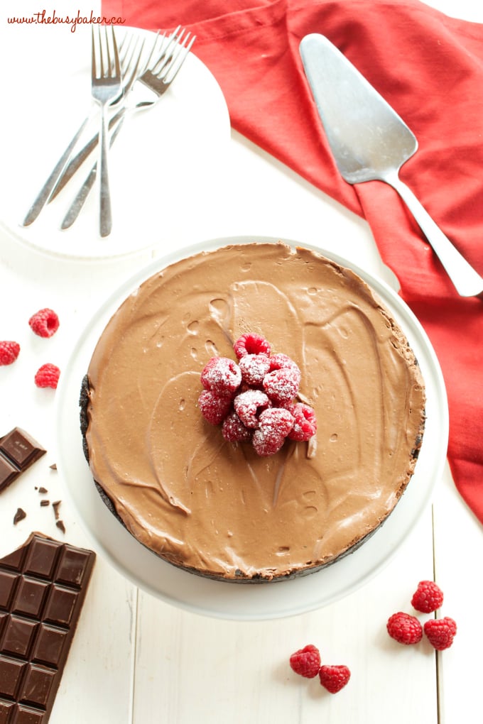 This No Bake Chocolate Mousse Cheesecake is the ultimate vegan and dairy-free chocolate dessert that's so smooth and creamy, made with a secret ingredient! Recipe from thebusybaker.ca #vegancheesecake #veganchocolatedessert #dairyfreedessert #dairyfreecheesecake #besteverchocolatecheesecake