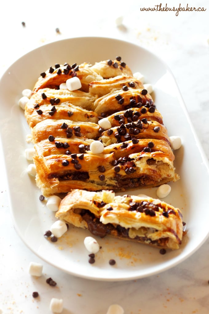 This Easy Peanut Butter S'mores Strudel is an easy recipe that makes the perfect breakfast or treat - made with only a few simple pantry ingredients! Recipe from thebusybaker.ca! #smores #homemadestrudel #smoresdessert #easybreakfast