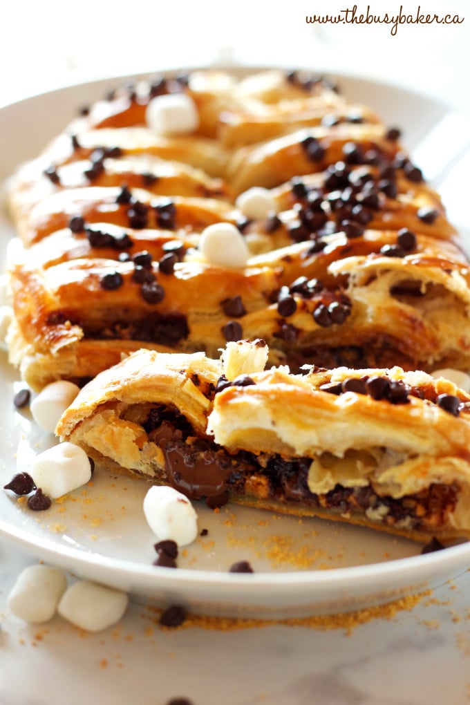 This Easy Peanut Butter S'mores Strudel is an easy recipe that makes the perfect breakfast or treat - made with only a few simple pantry ingredients! Recipe from thebusybaker.ca! #smores #homemadestrudel #smoresdessert #easybreakfast