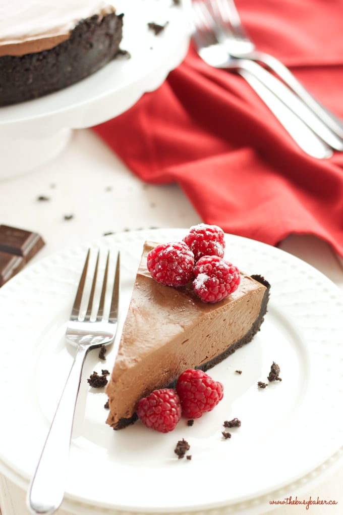 This No Bake Chocolate Mousse Cheesecake is the ultimate vegan and dairy-free chocolate dessert that's so smooth and creamy, made with a secret ingredient! Recipe from thebusybaker.ca #vegancheesecake #veganchocolatedessert #dairyfreedessert #dairyfreecheesecake #besteverchocolatecheesecake