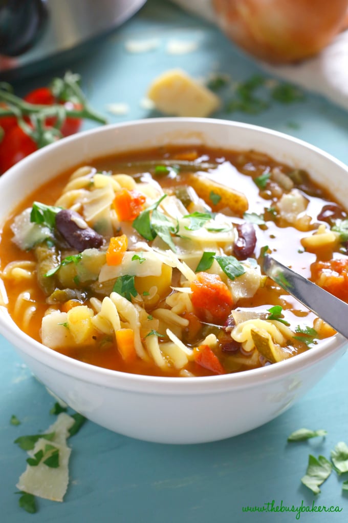 This Best Ever Slow Cooker Minestrone Soup is thick, comforting, and packed full of vegetables! It's so flavourful and easy to make, and it's the perfect way to warm up on a cold day! Recipe from thebusybaker.ca! #minestronesoup #slowcookersoup #slowcookerminestrone #besteverminestrone