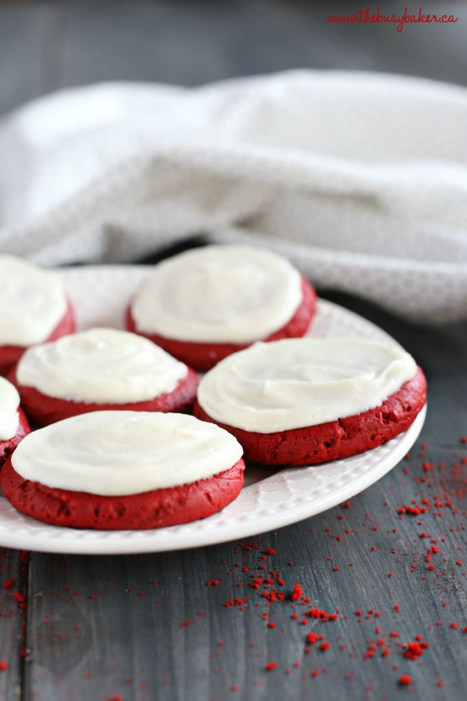 These Soft and Chewy Red Velvet Sugar Cookies are the perfect easy cookie recipe for Valentine's Day, Christmas, or any festive time of year. They're bright and colourful, gorgeous, delicious, and simple to make with only a few ingredients! Recipe from thebusybaker.ca! #cakemixcookies #redvelvetcookies #easyredvelvetrecipe #redvelvet