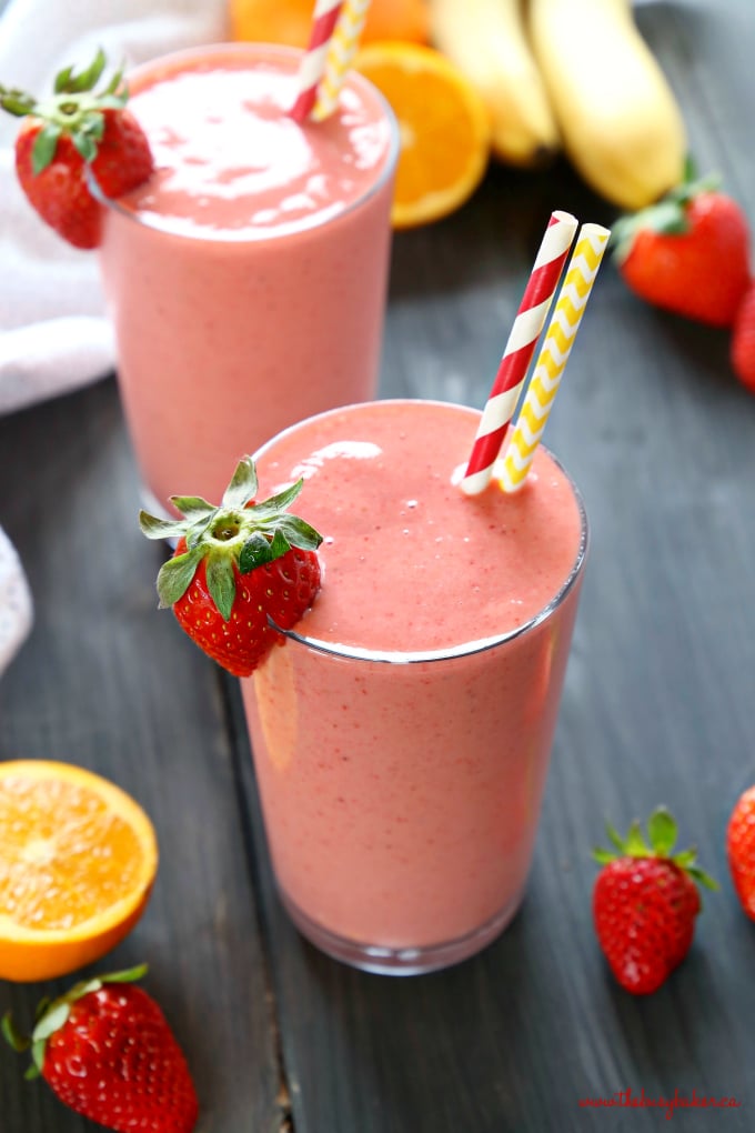 This Strawberry Banana Orange Power Smoothie is the perfect fruit smoothie packed with berries, bananas, and juicy oranges! It makes a great breakfast or post-workout drink, and it's the perfect mid-afternoon pick-me-up snack! Recipe from thebusybaker.ca! #workoutsmoothie #easysmoothie #healthysmoothie #strawberrysmoothie