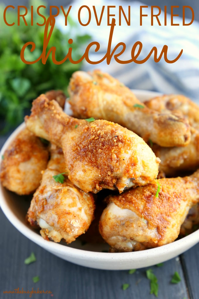 This Crispy Oven Fried Chicken is baked to crispy perfection in the oven with a delicious balance of herbs and spices! It's easy to make, lower in fat, and tastes just like fried chicken! And it's ready in under 30 minutes! Recipe from thebusybaker.ca! #ovenbakedchicken #crispychicken #healthychicken #ovenfriedchicken #copycatfriedchicken