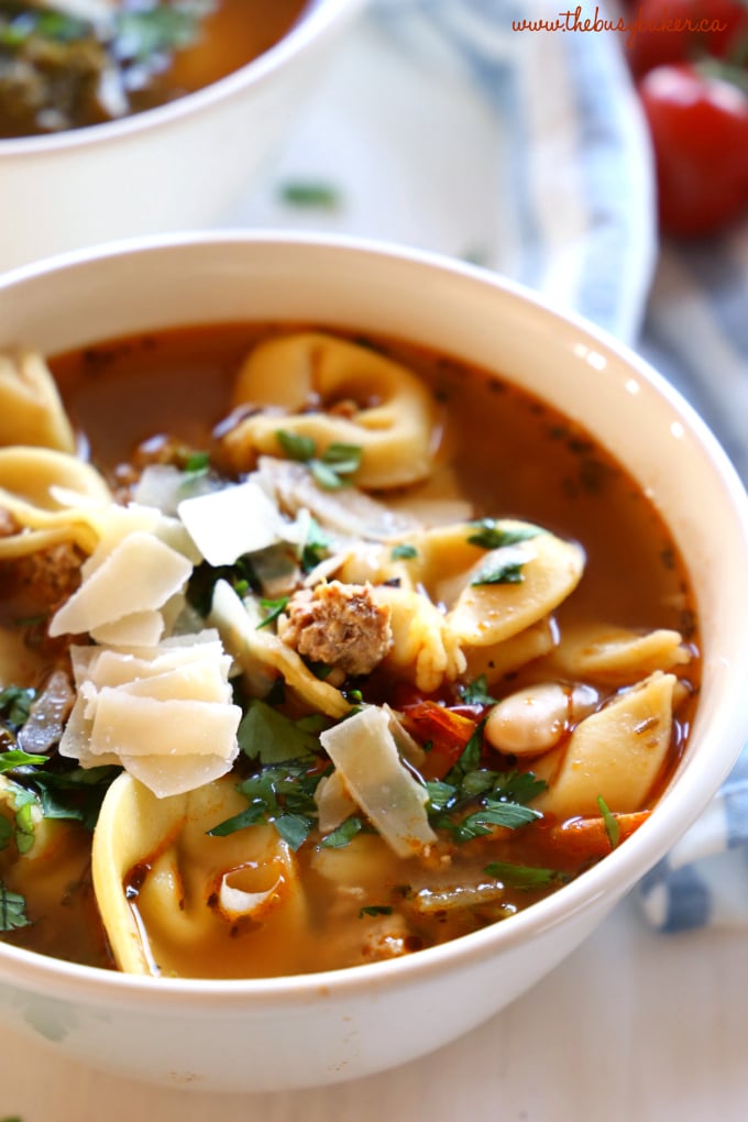This Rustic Italian Sausage Tortellini Soup is packed with fresh, wholesome ingredients and bursting with Italian flavours. It's hearty, filling, and is so easy to make! Recipe from thebusybaker.ca! #italiansoup #tortellinisoup #rusticsoup #easysouprecipe