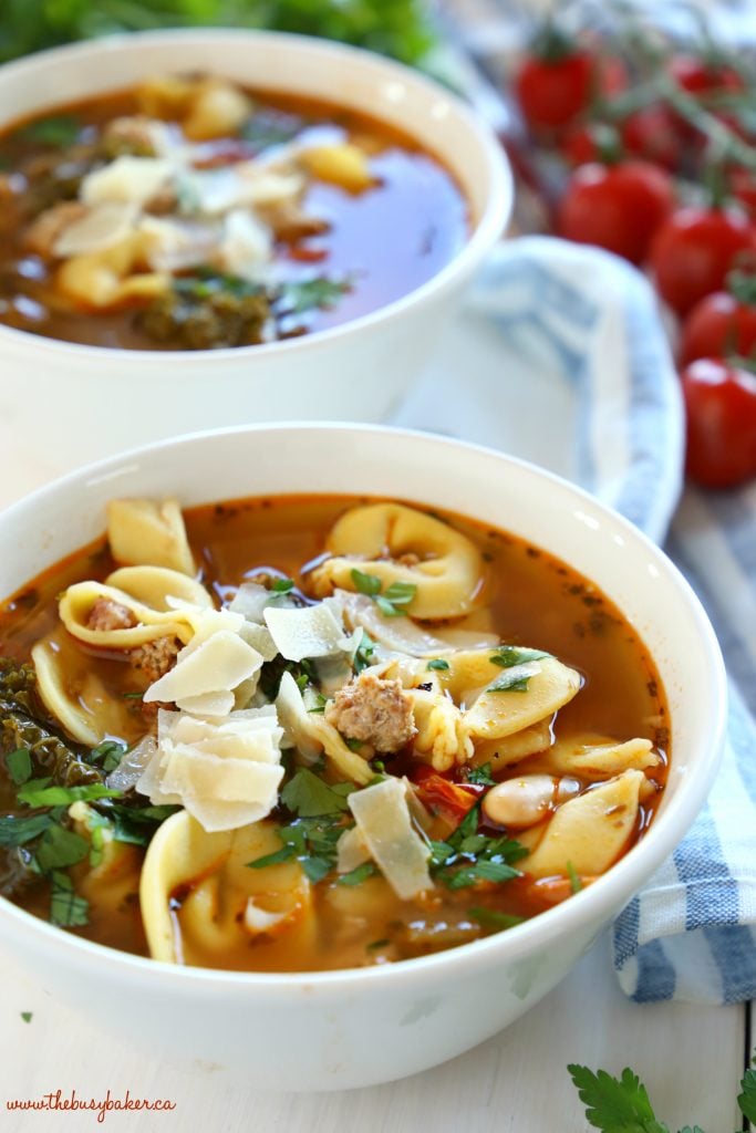 This Rustic Italian Sausage Tortellini Soup is packed with fresh, wholesome ingredients and bursting with Italian flavours. It's hearty, filling, and is so easy to make! Recipe from thebusybaker.ca! #italiansoup #tortellinisoup #rusticsoup #easysouprecipe