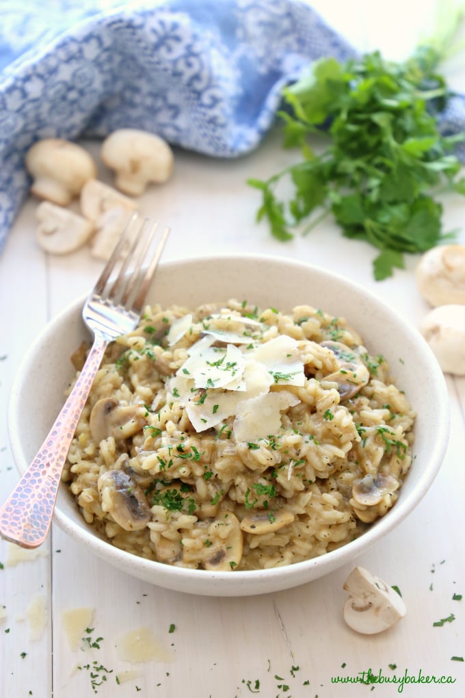 This Easy Mushroom Risotto is a quick and simple way to make restaurant-style risotto at home in minutes and in only one pan! Skip the fancy restaurant and enjoy it at home as a vegetarian main dish or side dish! Recipe from thebusybaker.ca! #easyrisotto #simplerisottorecipe #mushroomrisotto