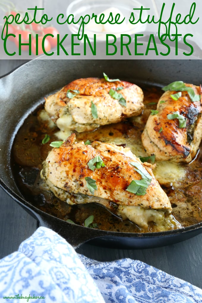 Pesto Caprese Stuffed Chicken Breasts in skillet with cheese