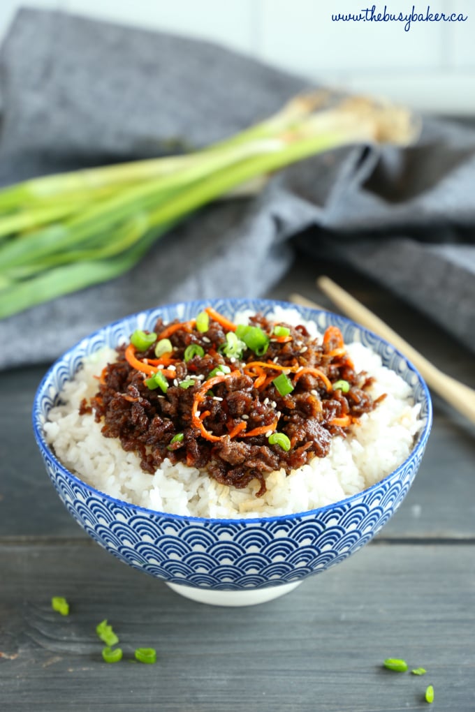 Easy Korean Beef Rice Bowls with green onions and grey kitchen towel