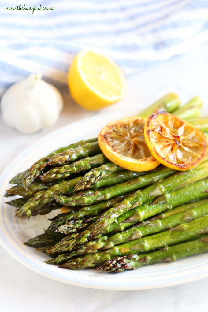  Roasted Asparagus on platter with garlic and lemon slices