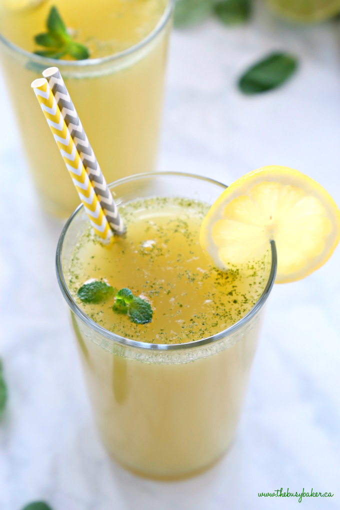 Healthy Sparkling Mojito Lemonade in glass with paper straws