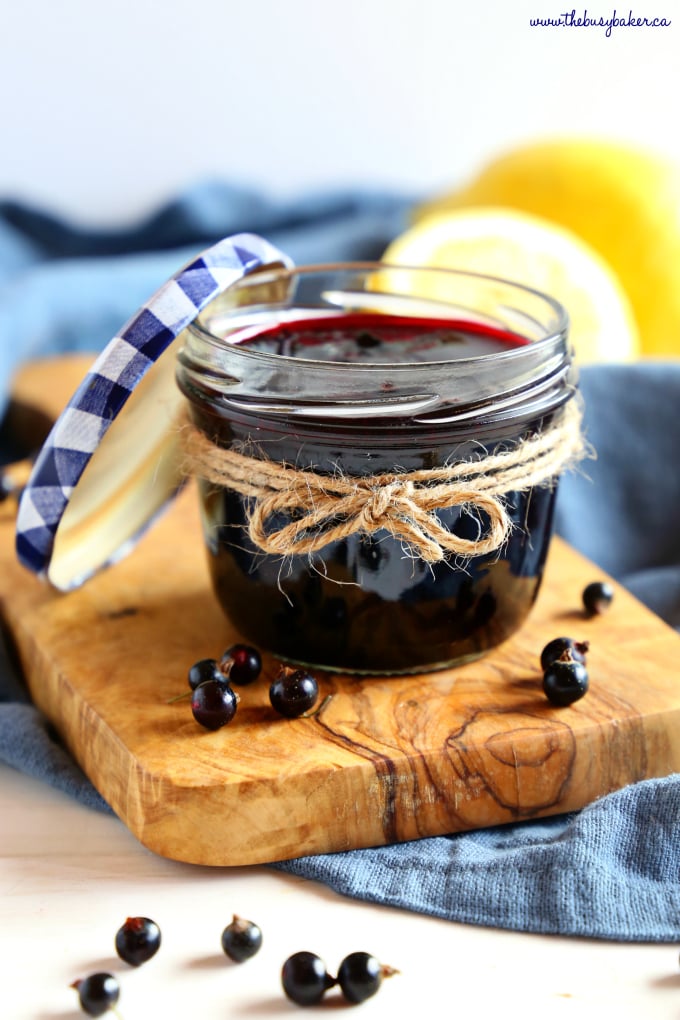 Best Ever Black Currant Jam in mason jar with blue lid