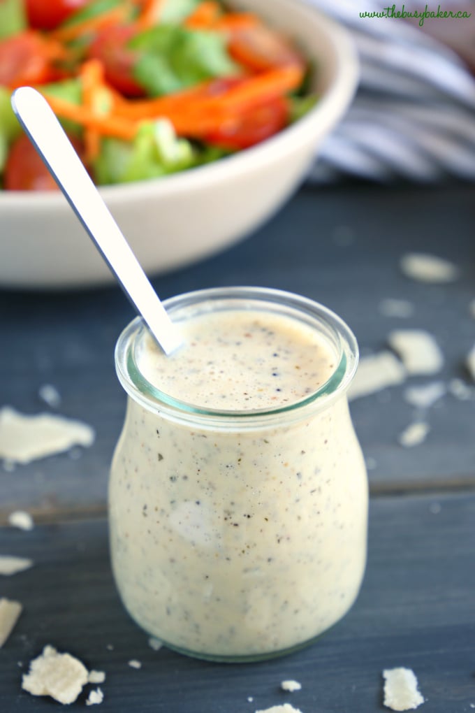 Classic Creamy Italian Salad Dressing in jar with spoon