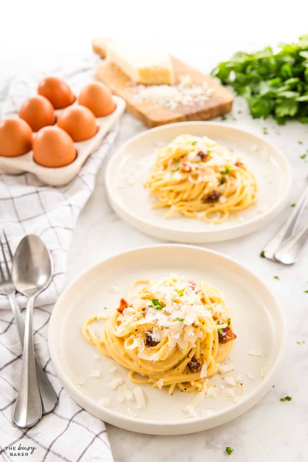 2 plates of pasta carbonara