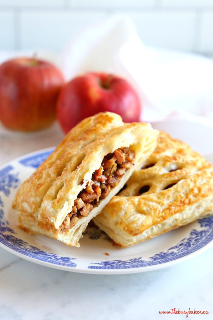 Easy Homemade Apple Strudel with filling on blue vintage plate with red apples