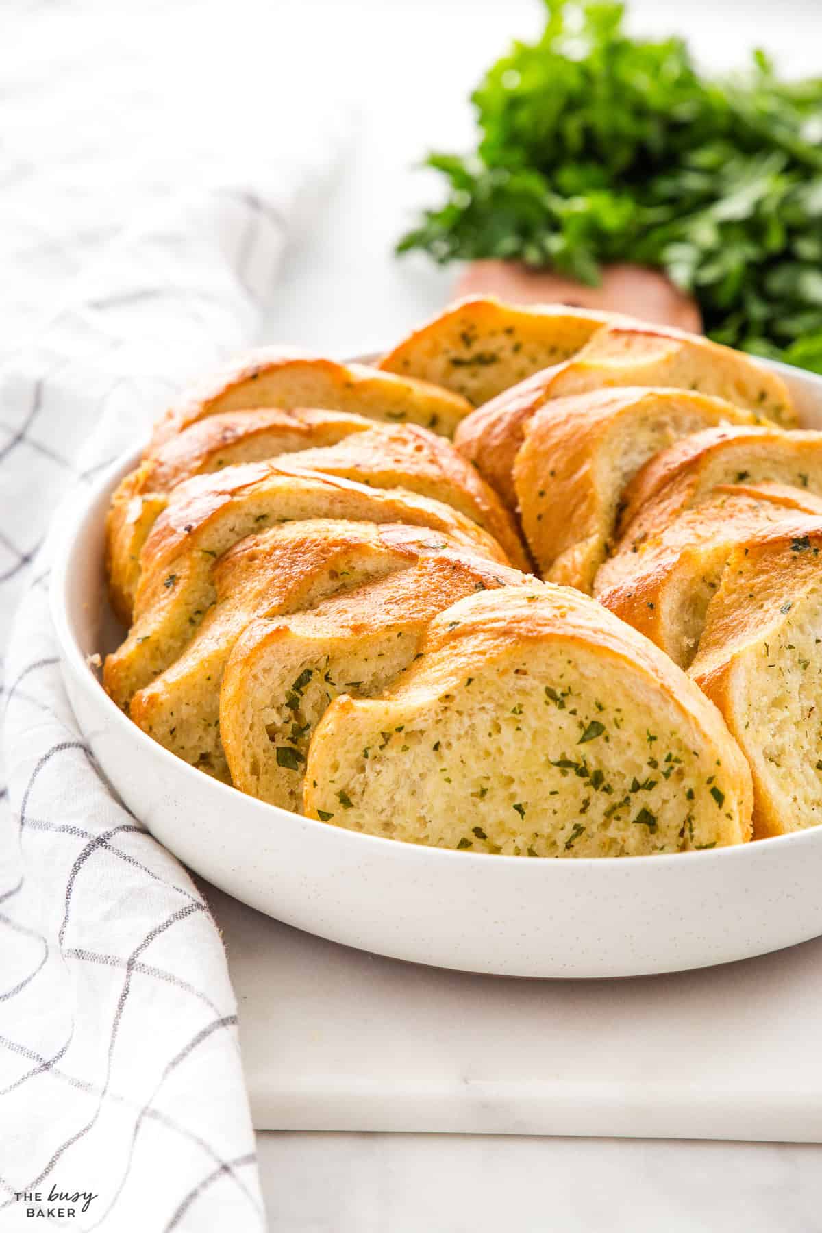 garlic bread in a white bowl