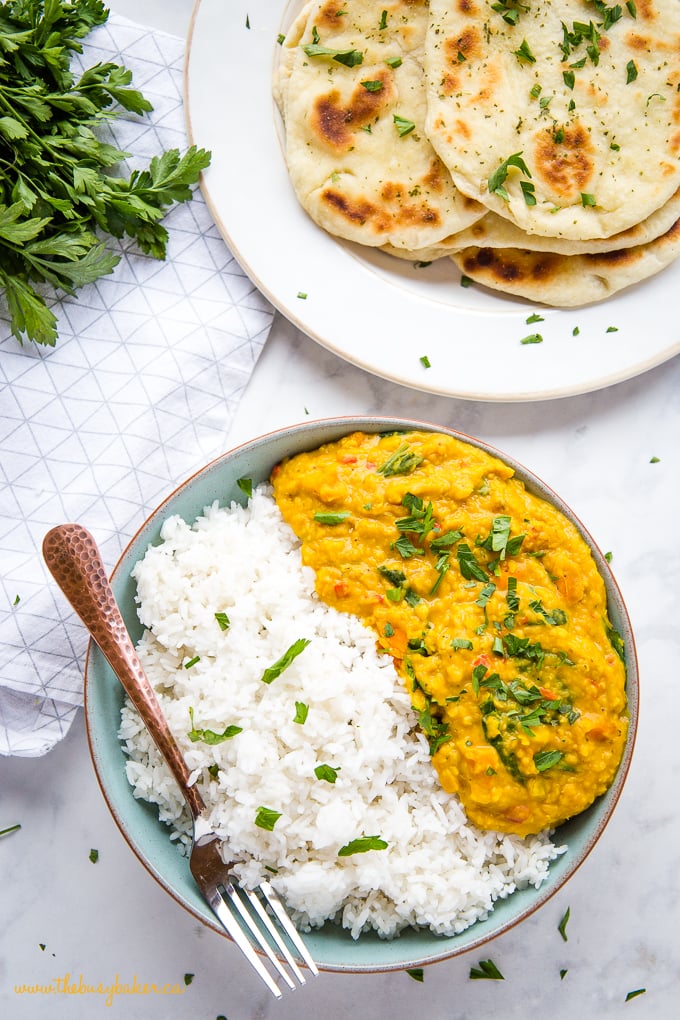 Easy One Pan Lentil Daal Curry in turquoise bowl with copper fork