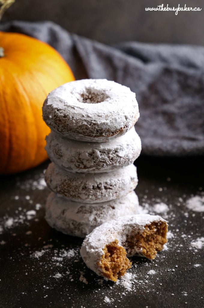 Pumpkin Spice Baked Donuts with pumpkin and powdered sugar