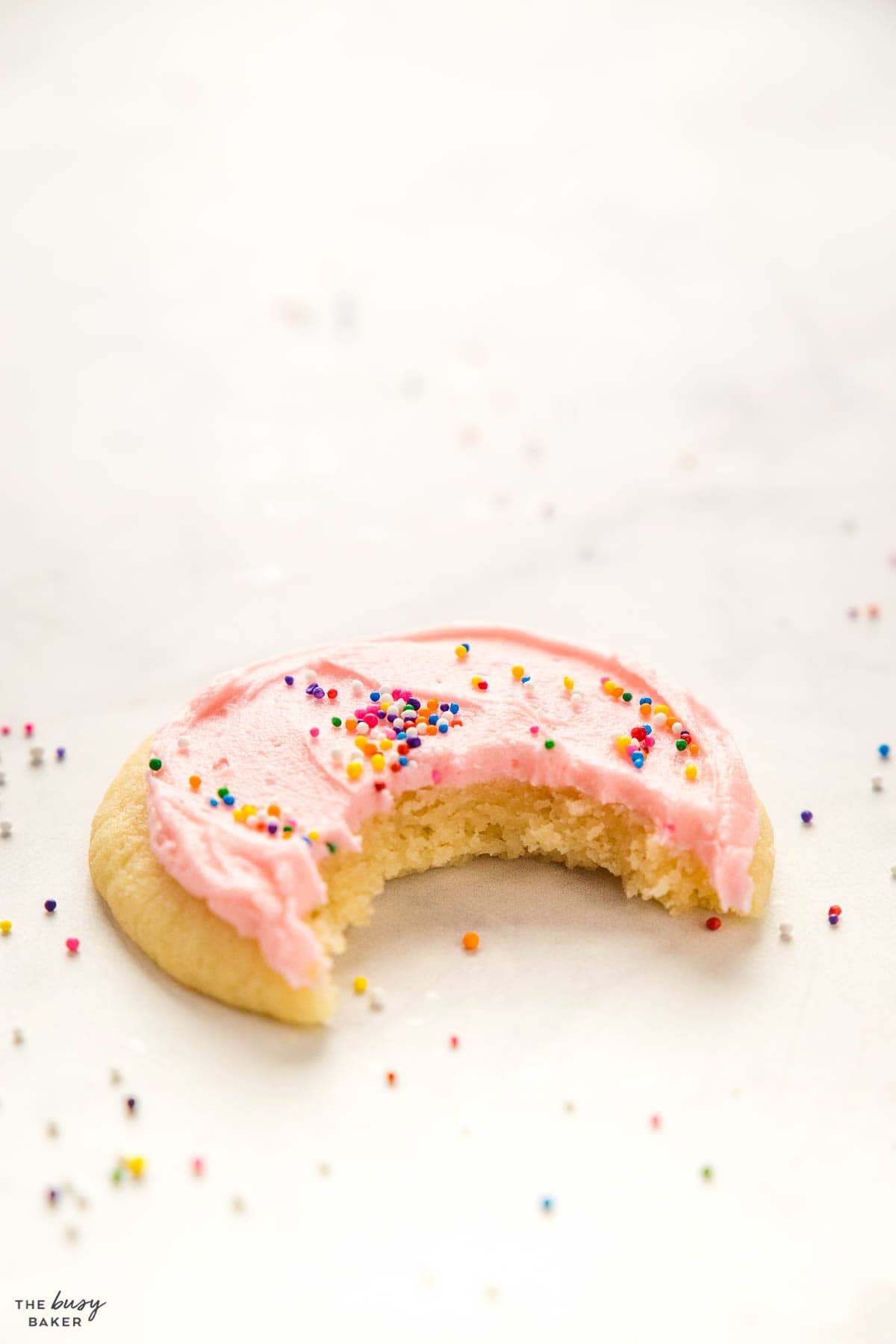 sugar cookie with a bite out of it