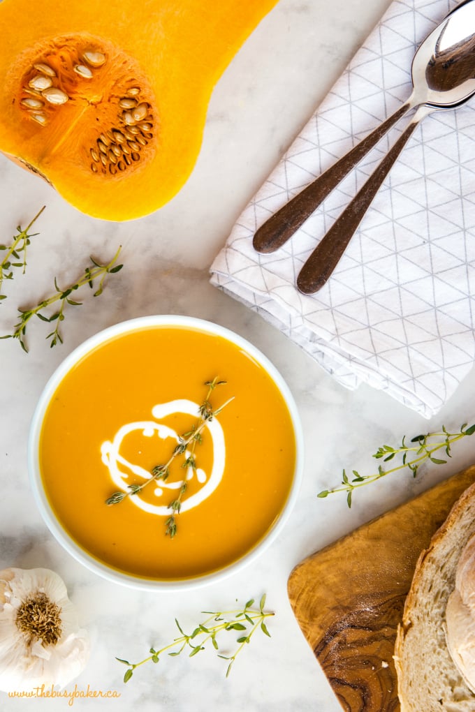 Creamy One Pot Butternut Squash Soup with crusty bread and fresh thyme