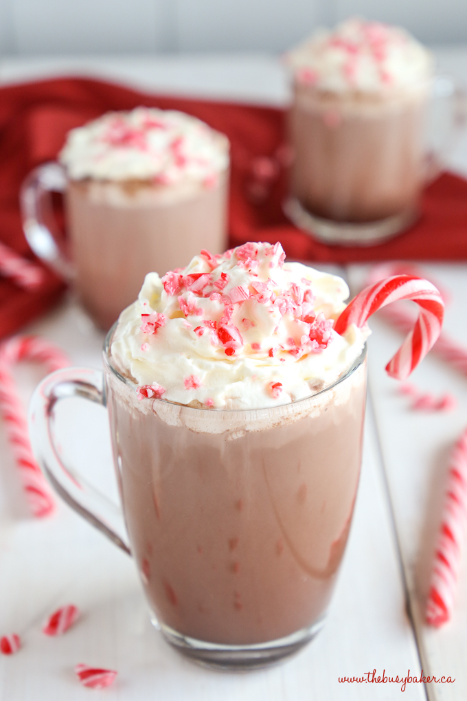 Healthier Slow Cooker Peppermint Hot Chocolate in glass mug with whipped cream