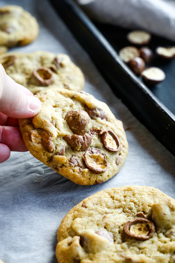 Maltesers Chocolate Chip Cookies in hand