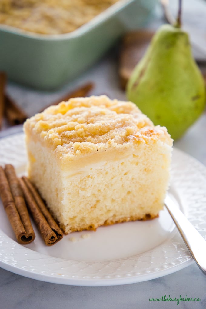 Pear Cake with cinnamon sticks on plate