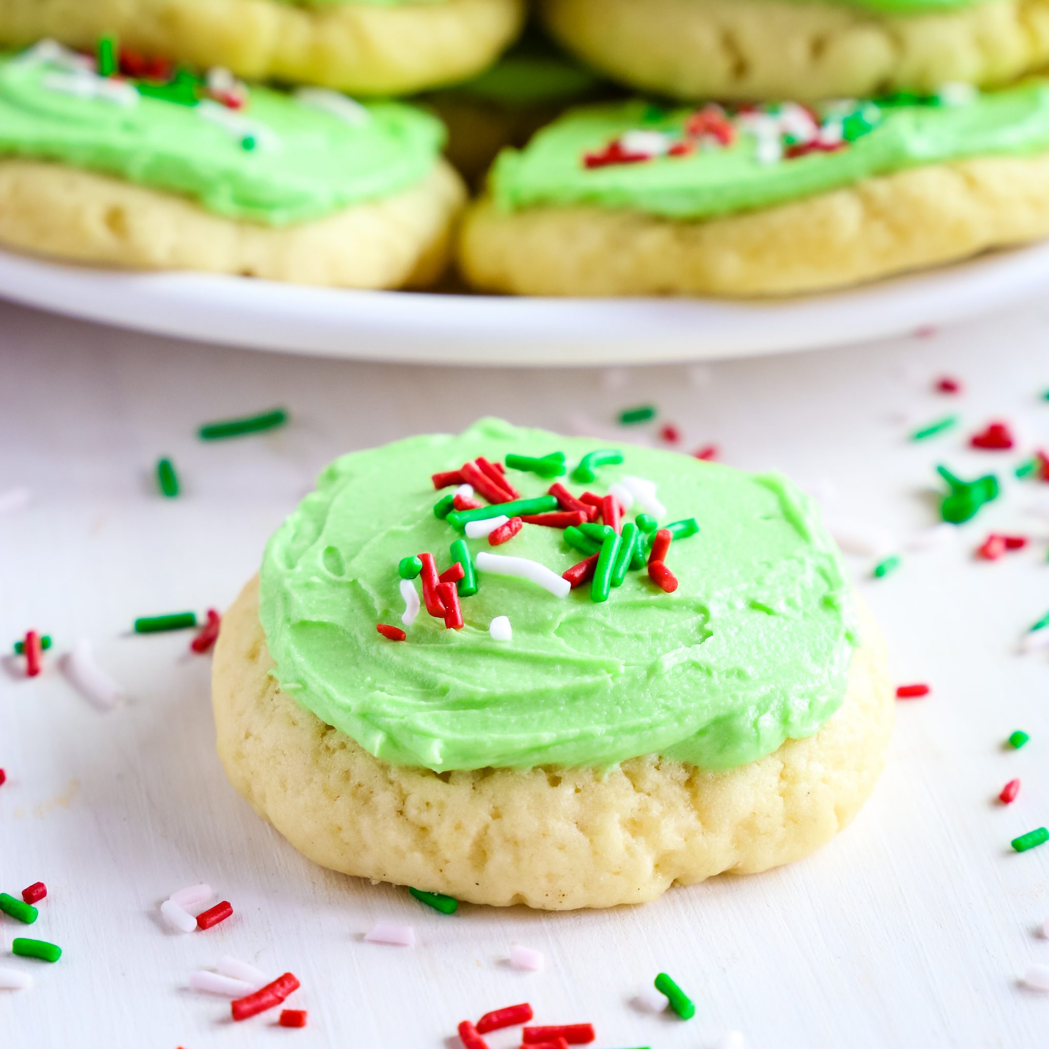Soft And Chewy Christmas Frosted Sugar Cookies The Busy Baker