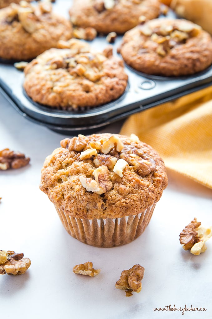 Best Ever Banana Nut Muffins with walnuts in muffin tin