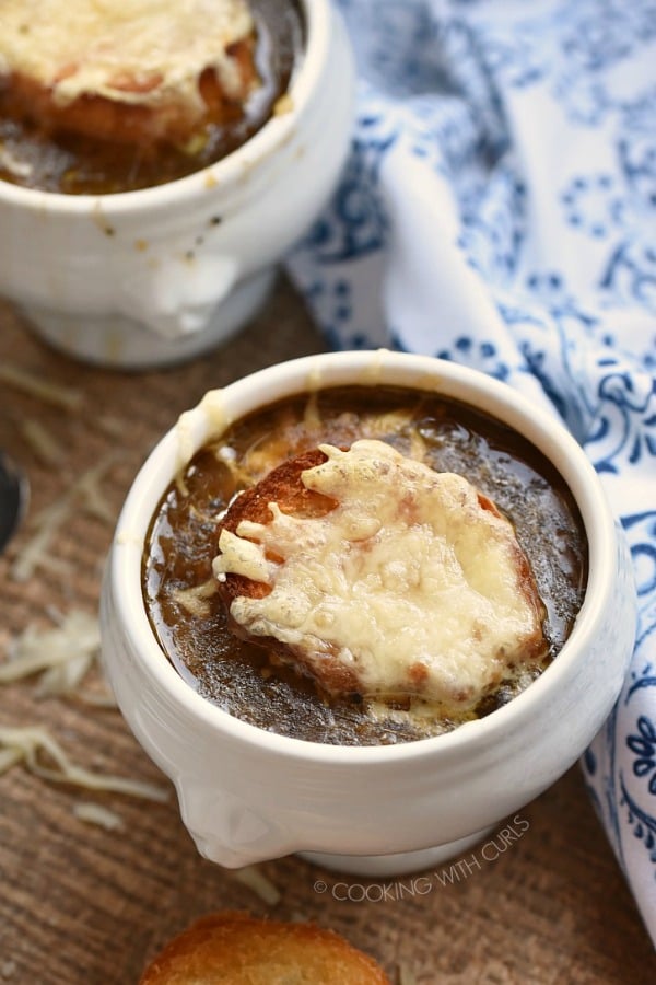 soup crock filled with Instant Pot French onion soup