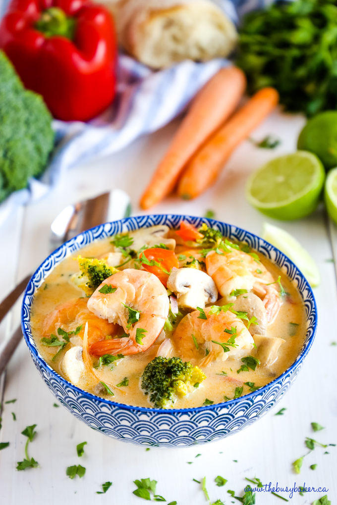 Thai Coconut Curry Shrimp Soup in blue bowl with veggies