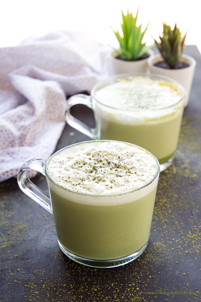 Healthy Matcha Latte in glass mug with foam