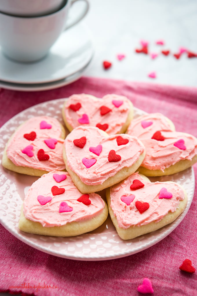 Classic Sour Cream Sugar Cookies on pink plate