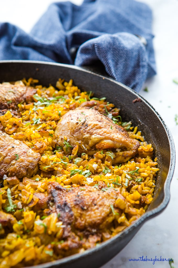 Easy One Pan Chicken with Turmeric Rice with blue kitchen towel