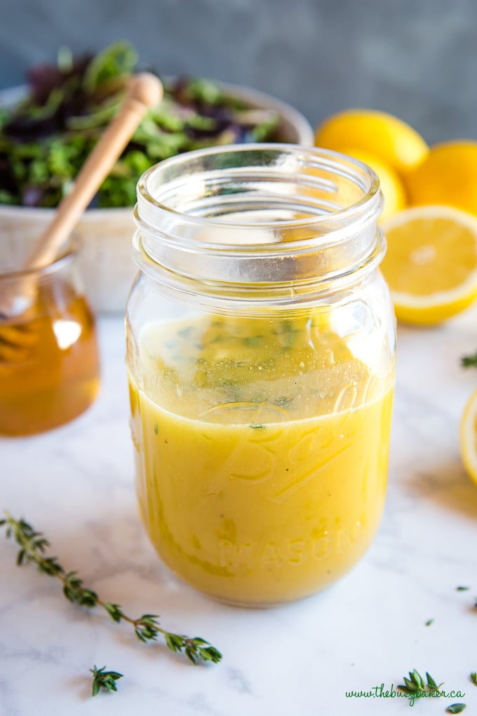 easy and healthy Honey Lemon Vinaigrette Salad Dressing with fresh thyme in mason jar