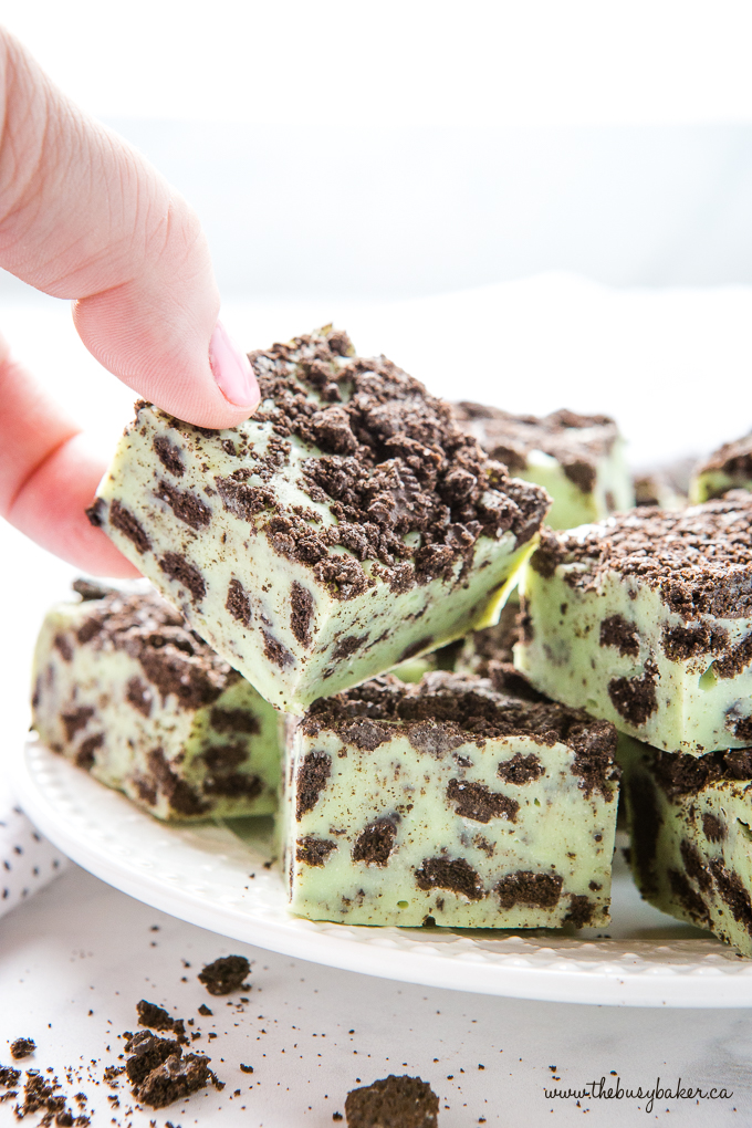 mint chocolate treat in hand with cookies and cream