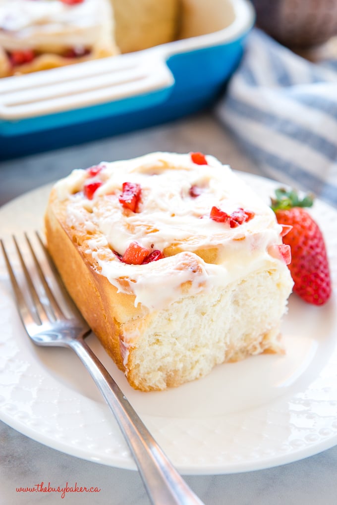 Strawberry Cheesecake Sweet Rolls on white plate with fork