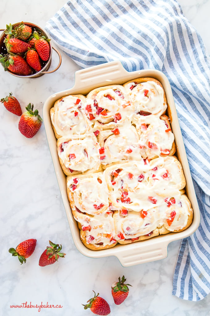 Strawberry Cheesecake Sweet Rolls in blue casserole dish