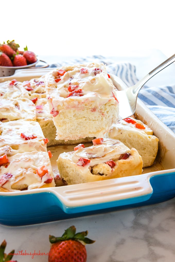 Strawberry Cheesecake Sweet Rolls in blue casserole dish